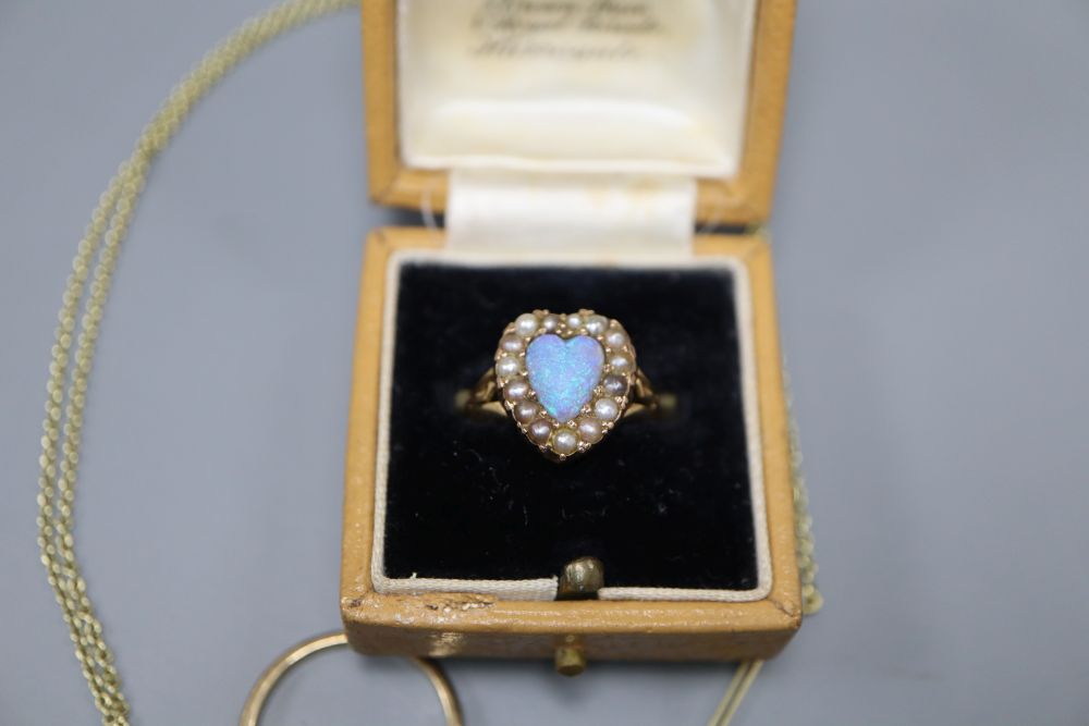 Opal set jewellery: a gold and 2 stone opal pendant necklace, a solitaire opal ring & an 18ct gold opal & seed pearl cluster heart ring